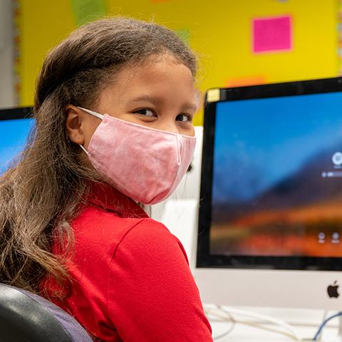 A 2020 file photo shows a student at a computer.